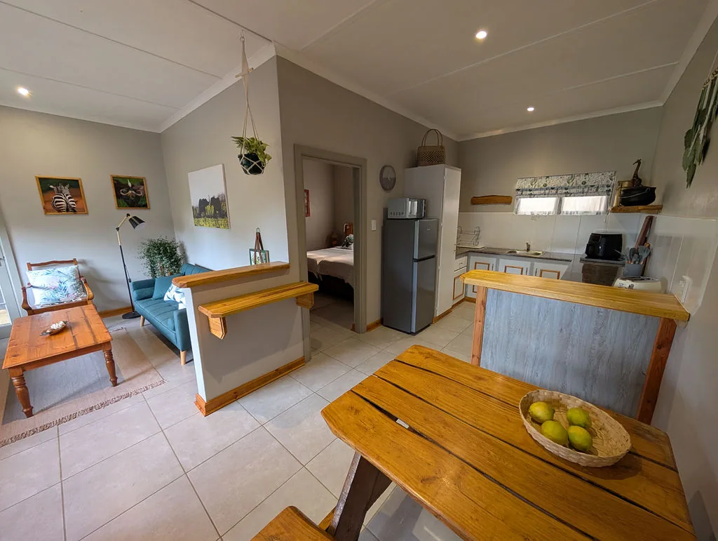 Open-plan lounge, kitchen and dining area at The Wood Haven
