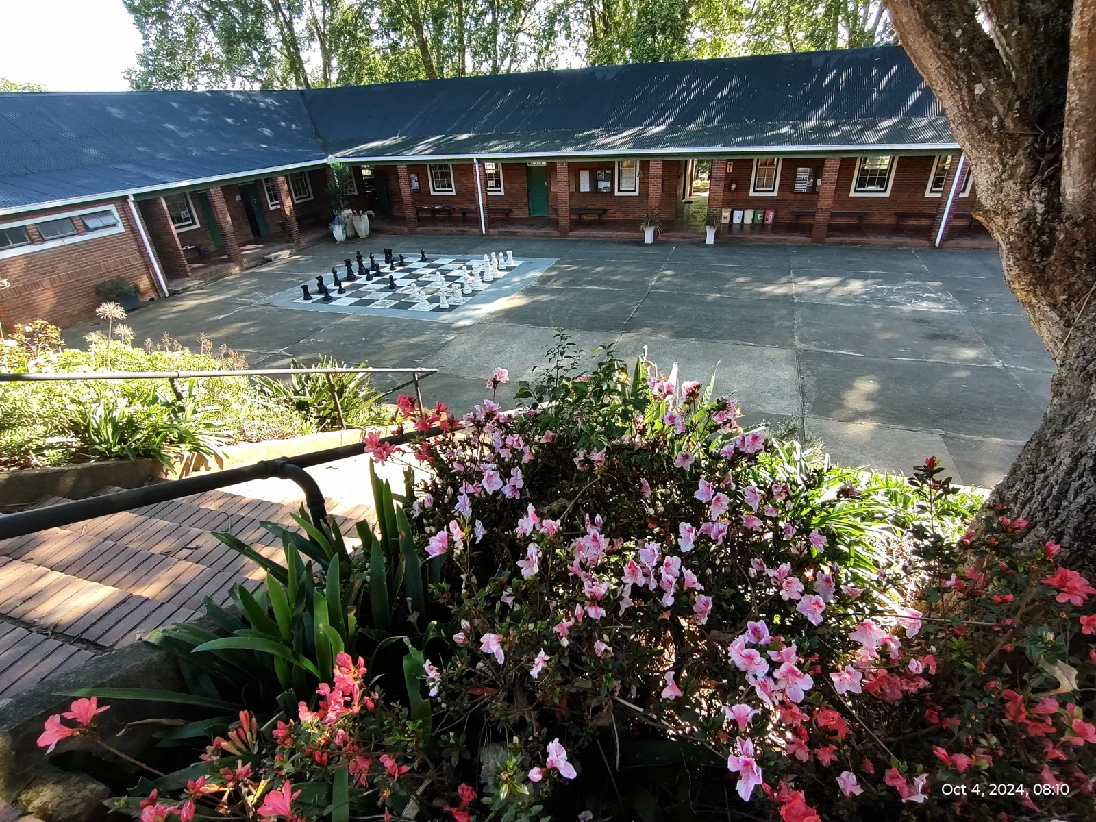 The school courtyard with a large outdoor chess board